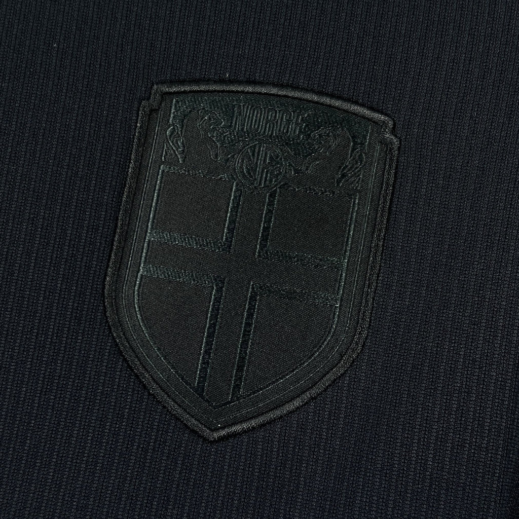 Norway away fan soccer jersey shield patch logo in dark navy, textured embroidery